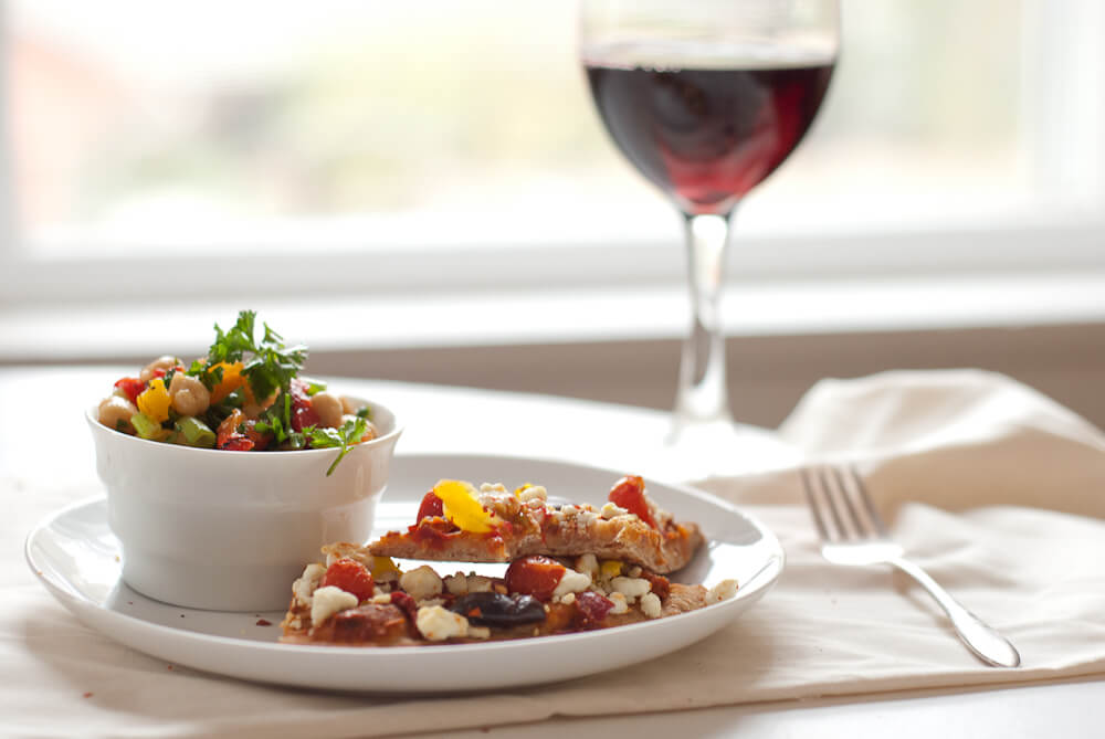 chickpea salad with pita pizza and red wine