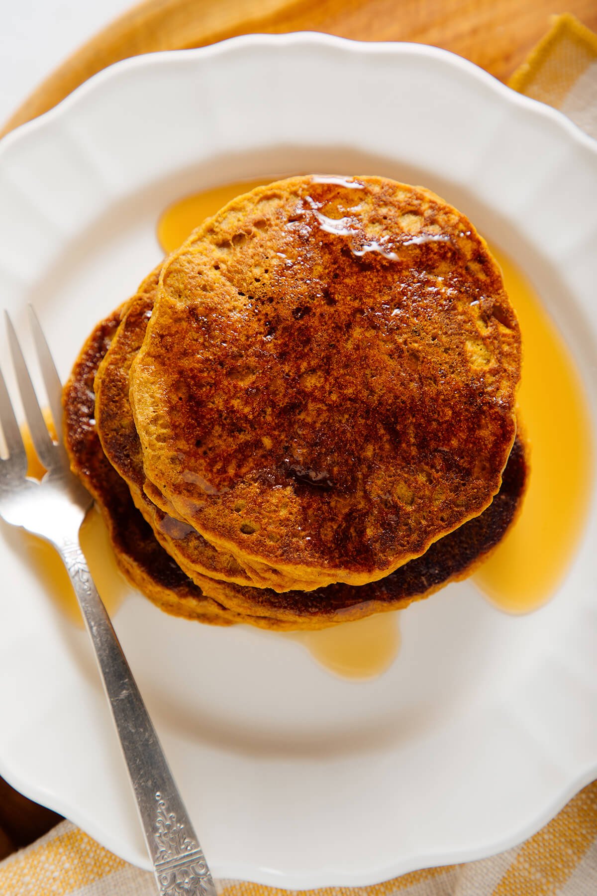 pumpkin oat pancakes with maple syrup