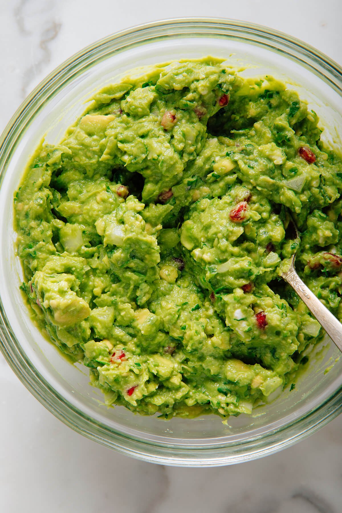 pomegranate guacamole in bowl