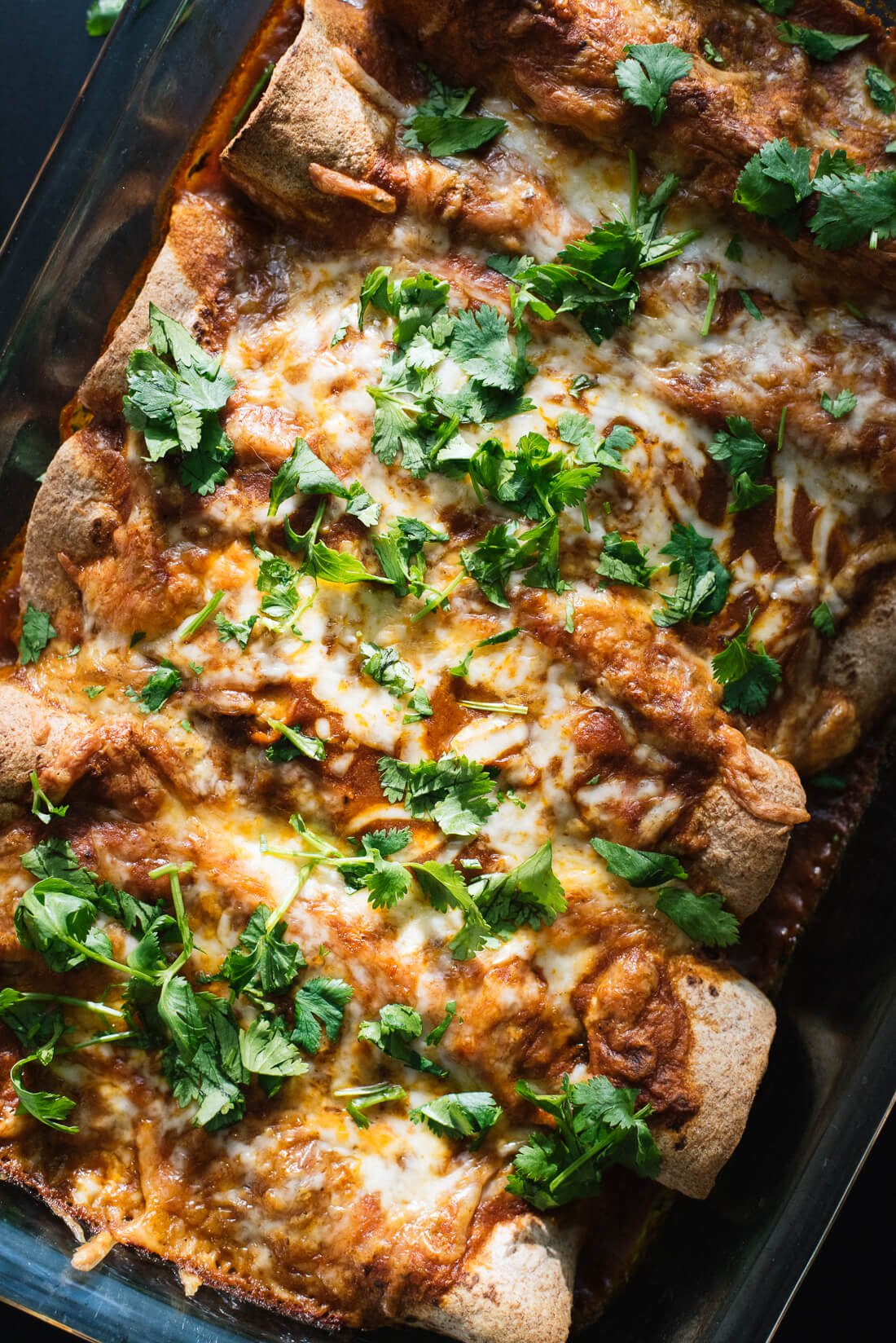 Vegetarian spinach, artichoke and black bean enchiladas with a simple homemade red sauce