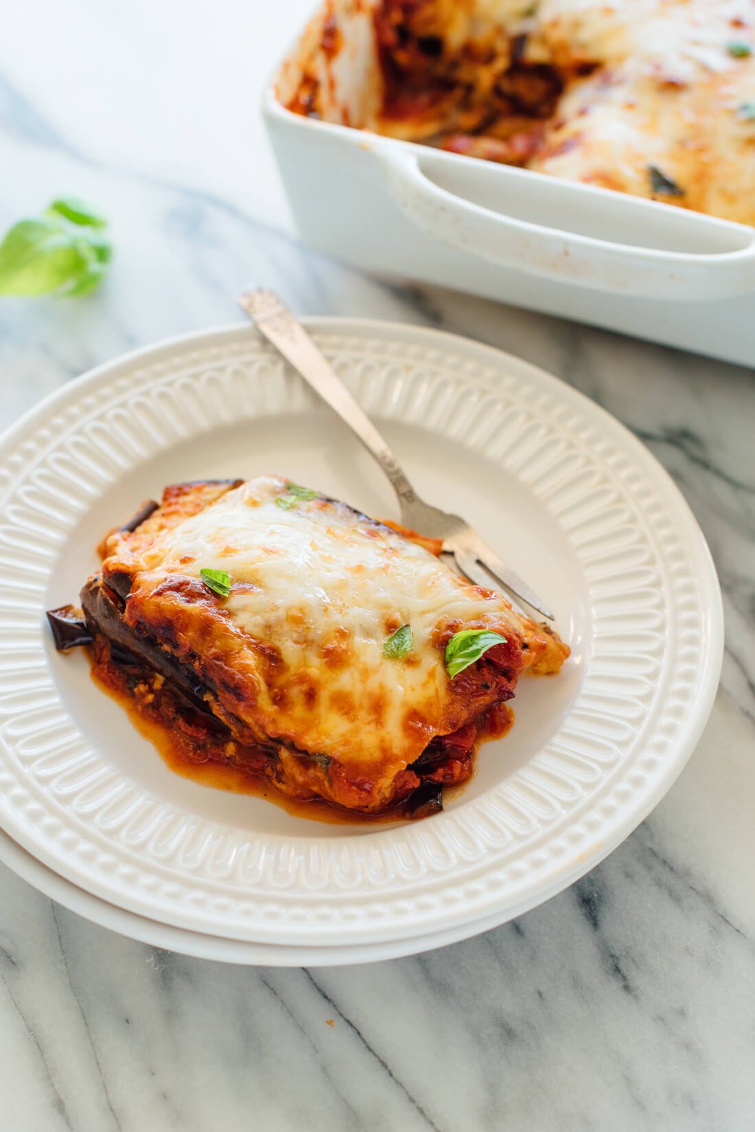 The best eggplant Parmesan recipe, made with baked eggplant and no breading! It's like lightened-up lasagna.