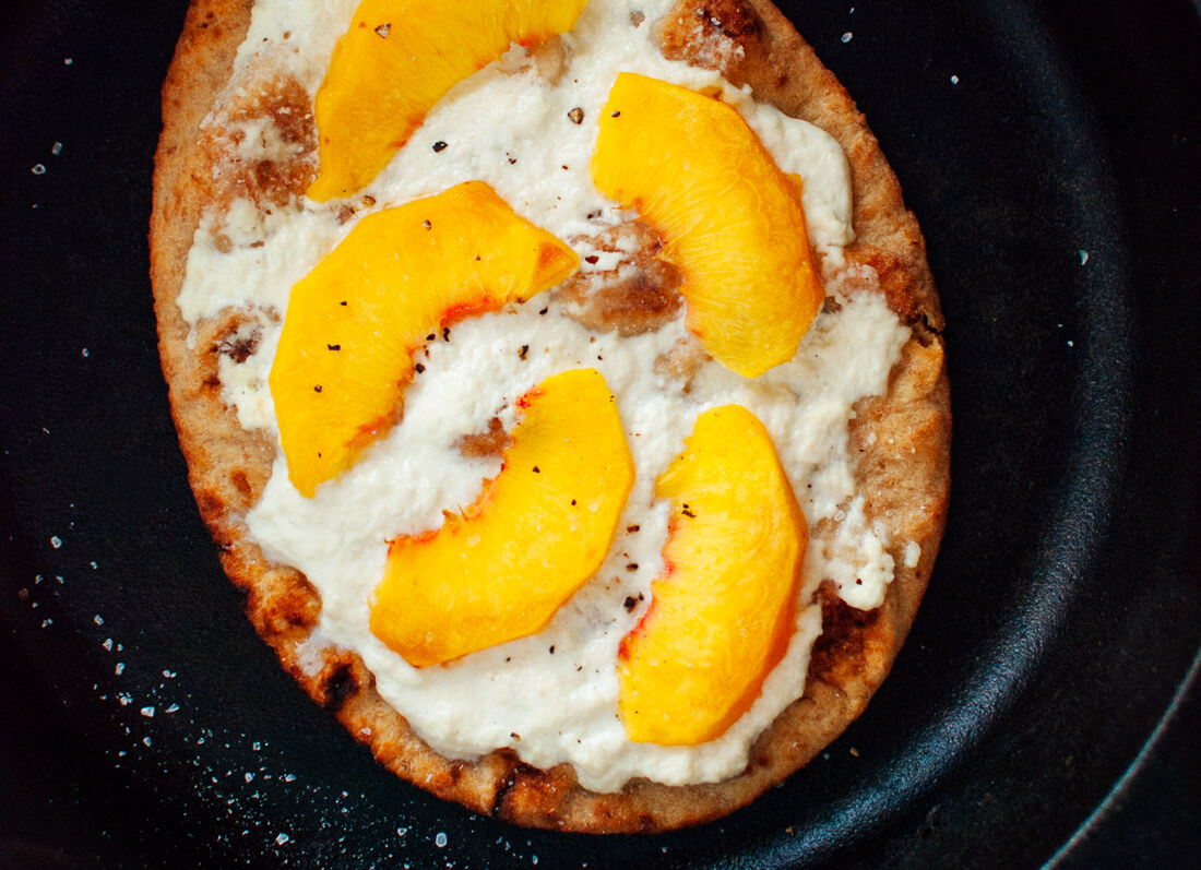 Simple Peach, Basil and Ricotta Flatbread in skillet