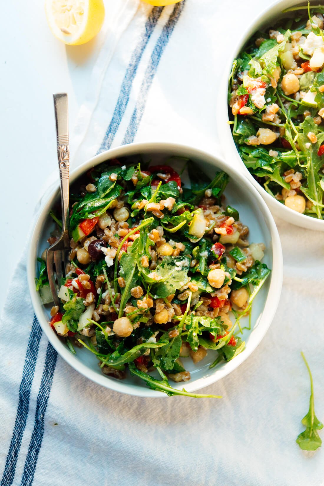 Greek arugula farro salad in bowls