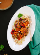 Spicy Thai Peanut Sauce over Roasted Sweet Potatoes and Rice