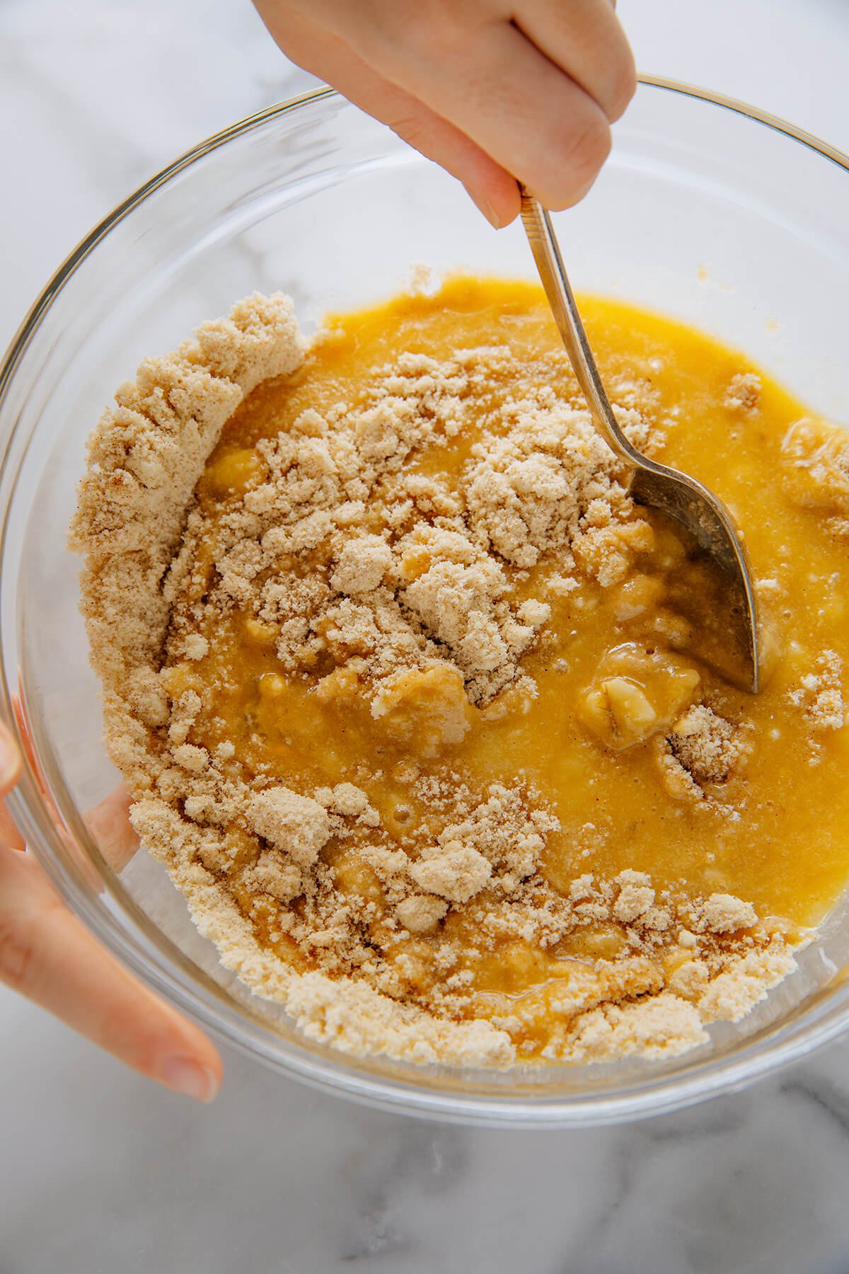 mixing banana muffin batter