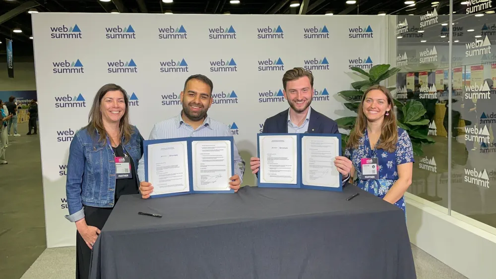 ImmigrateAI Global signing MOU at Web Summit Vancouver