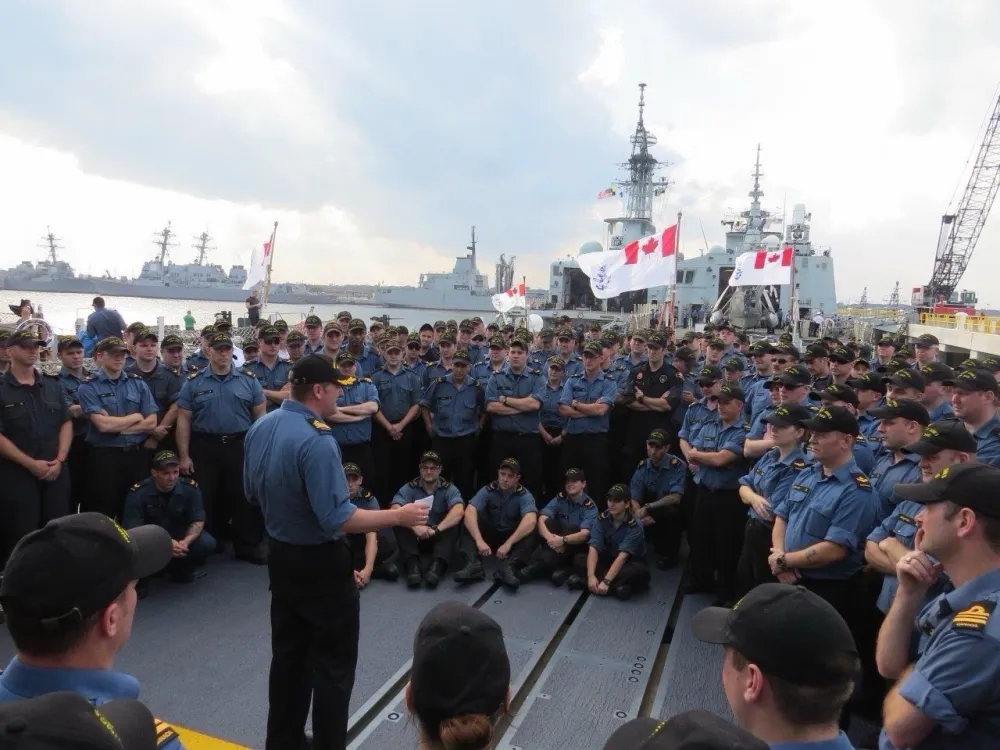 Sheldon addressing the navy.
