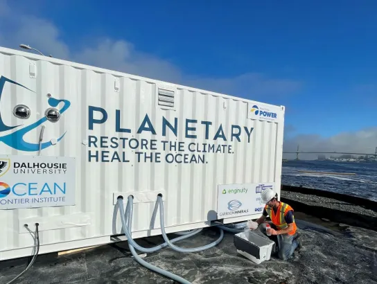 Planetary Site Automation and Monitoring System pictured next to ocean.