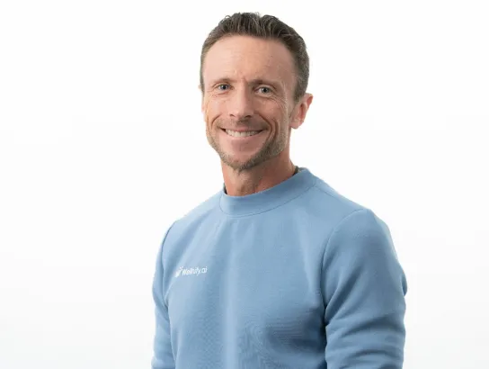 Travis McDonough, founder & CEO of Wellnify.ai, headshot