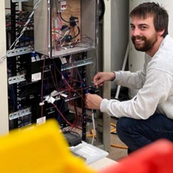 Research Associate, Ben Sabean, working on an EV battery storage system in the Applied Energy Research Lab at Ivany Campus. (NSCC)
