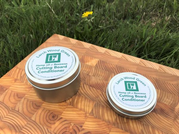 Two containers of Larch Wood cutting board conditioner