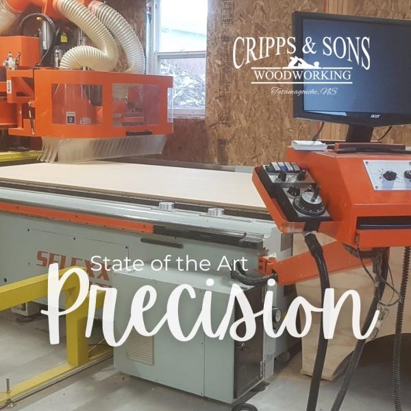 Cripps & Sons Precision: Cabinet door being cut to size with woodworking equipment