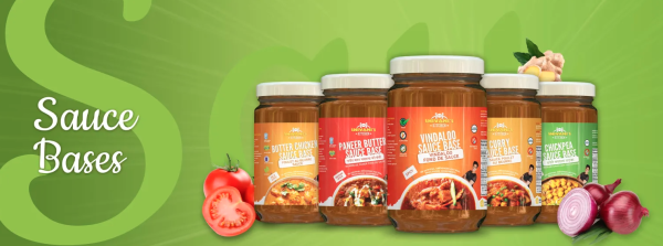 Bottles of Indian sauce products with green background