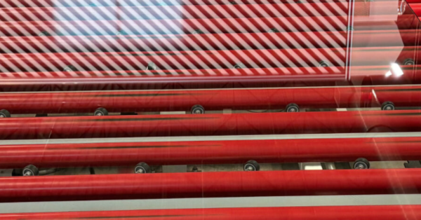 A block of tempered glass on rollers