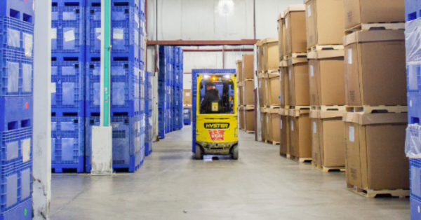Forklift inside warehouse