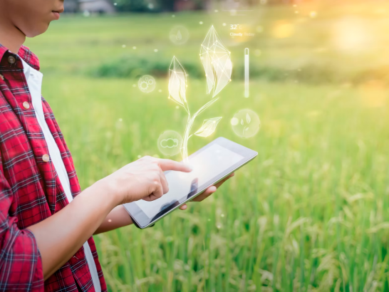 INTAG Bio researcher in field using an iPad