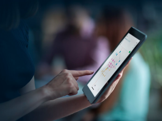 Finger on laptop with an EndFirst OverVue chart displayed on the screen